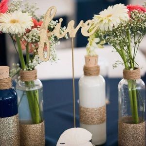 Gold glitter cursive wedding table numbers